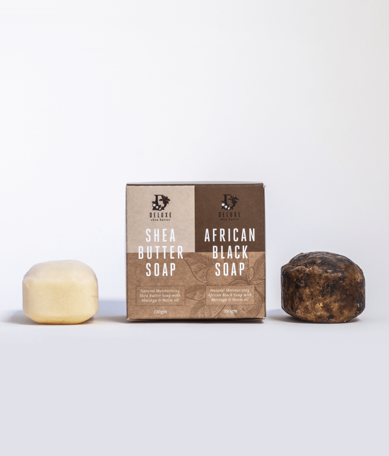 A Deluxe African Black Soap bar, and Deluxe Shea Butter Soap bar next to product box.